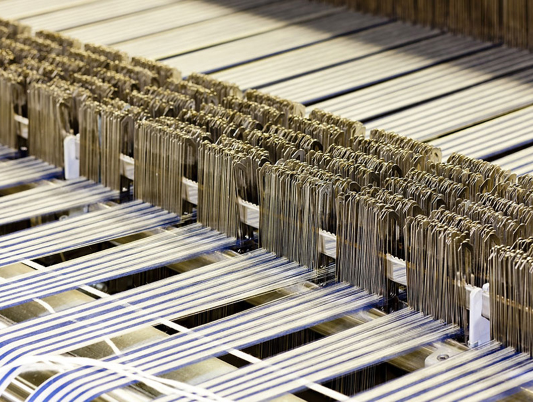 Textile weaving machinery